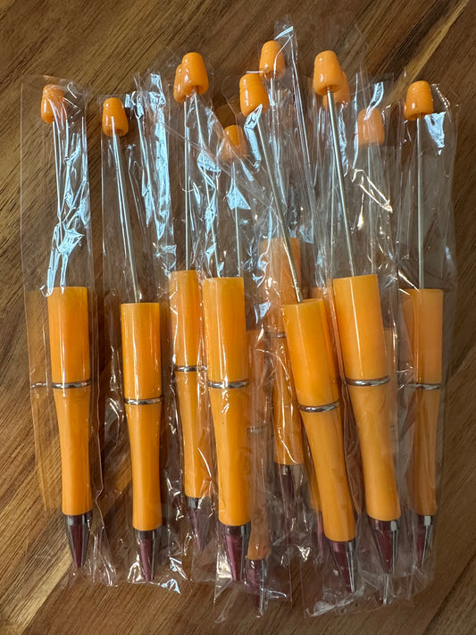 Orange plastic pens (wholesale)